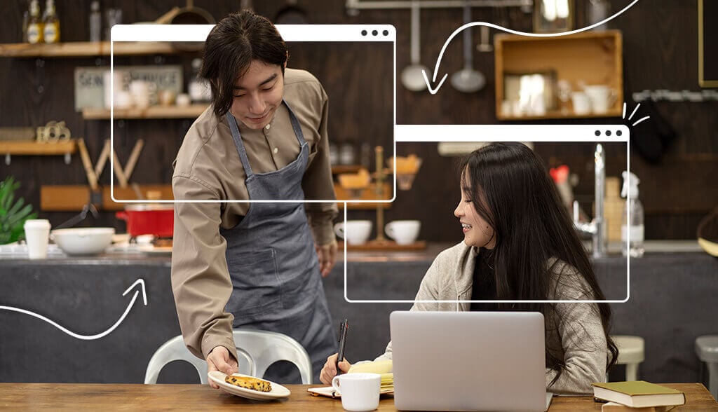 male waiter giving order to young woman sitting down