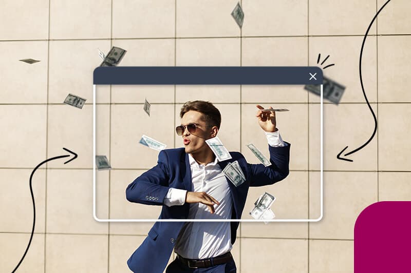 man dancing with money in the air