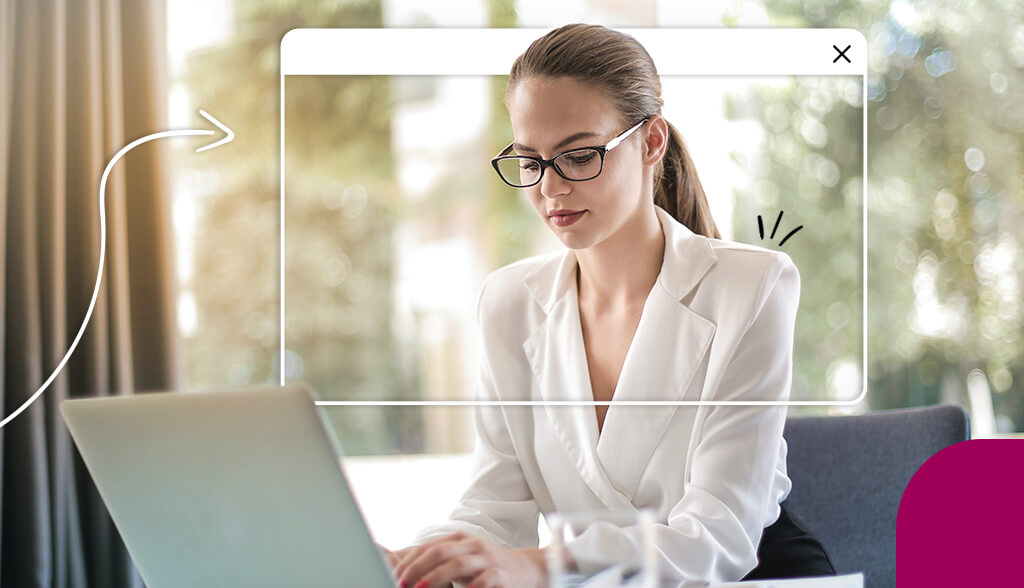 professional woman sitting in front of laptop