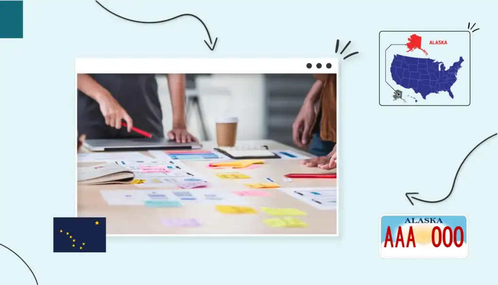 Two small business owners standing around a table that is covered in papers and colourful sticky notes in Alaska