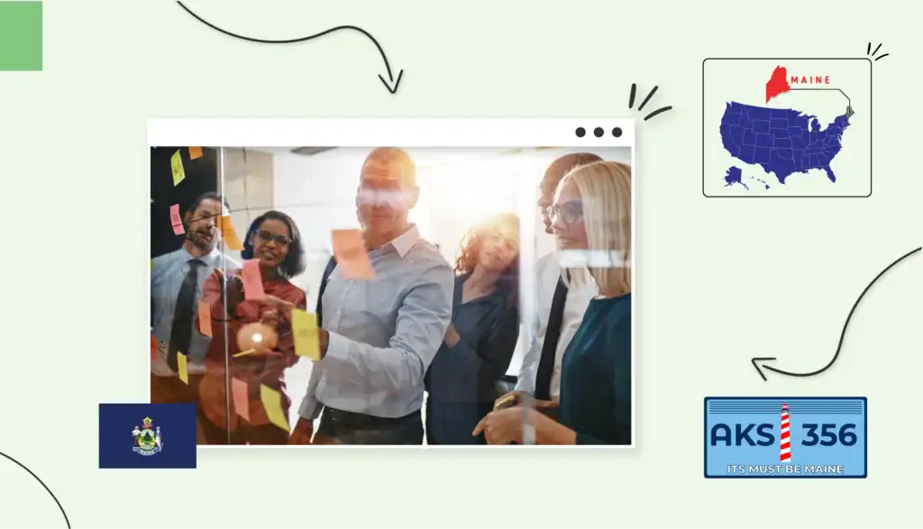 Small business owners looking at sticky notes on a board in Maine