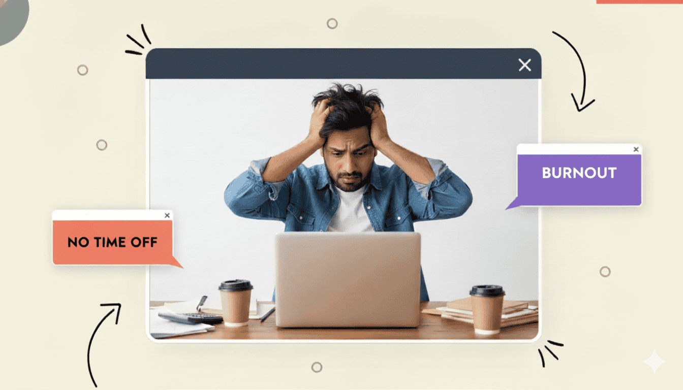 Small business owner holding his head in his hands while looking at his laptop in stress as he experiences burnout
