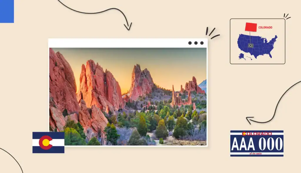 Large red sandstone rock formations at Garden of the Gods in Colorado Springs, with pine trees and low shrubs in the foreground and a clear sky behind them. 