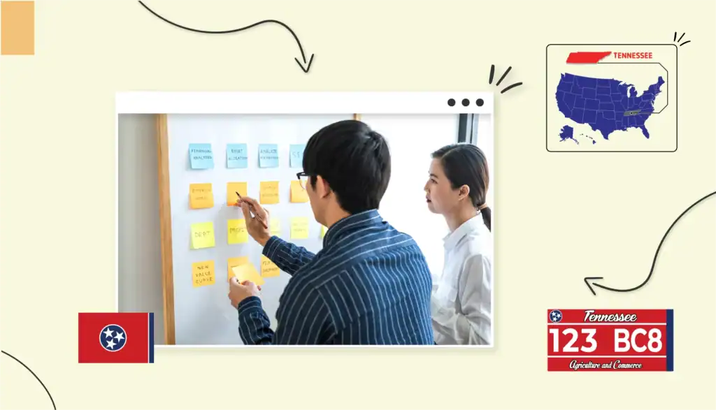 Two small business owners placing colorful sticky notes onto a whiteboard in Tennessee