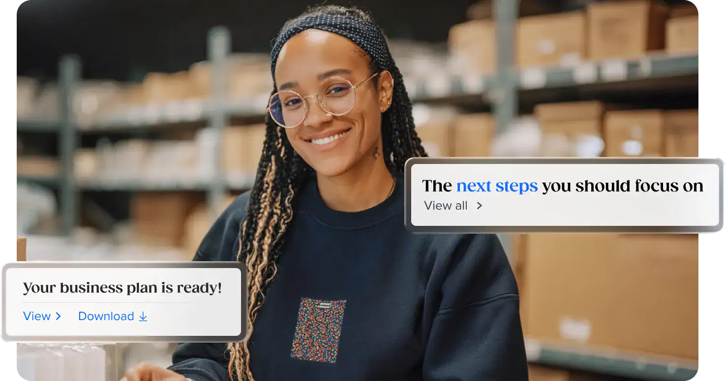 Business woman in a warehouse getting a business plan ready